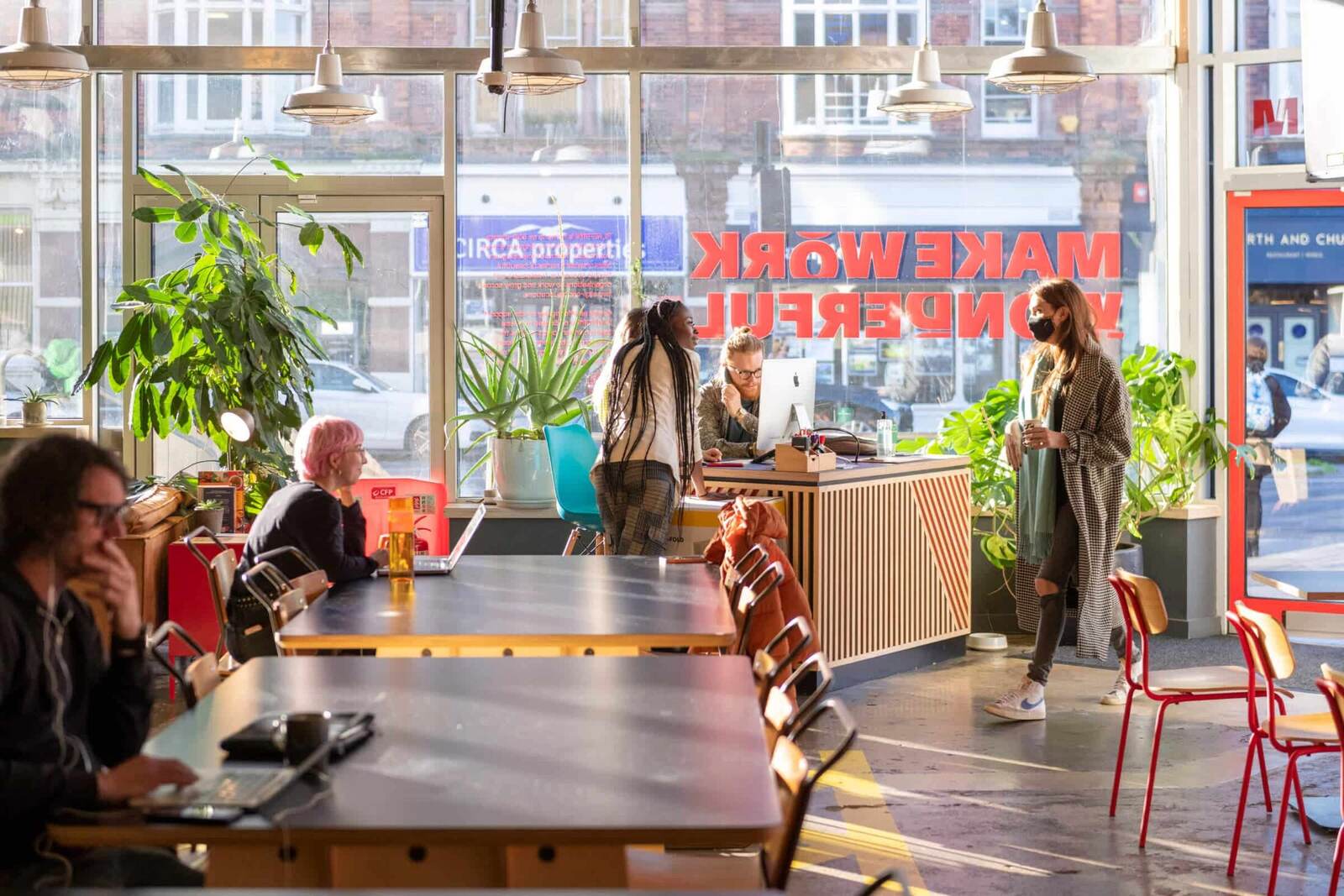 People working together inside a PLATF9RM coworking space in Brighton