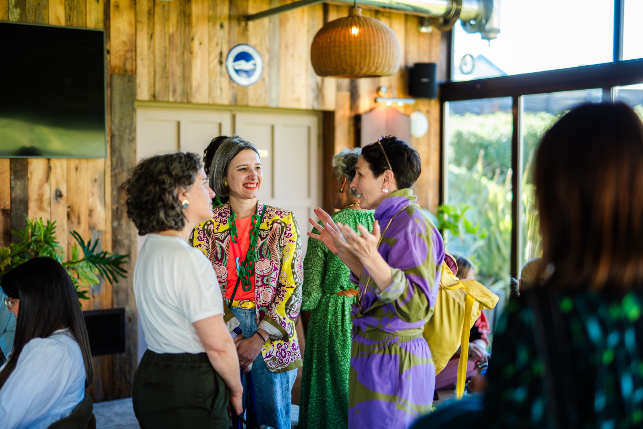 Guests talking at a house of hopium gathering