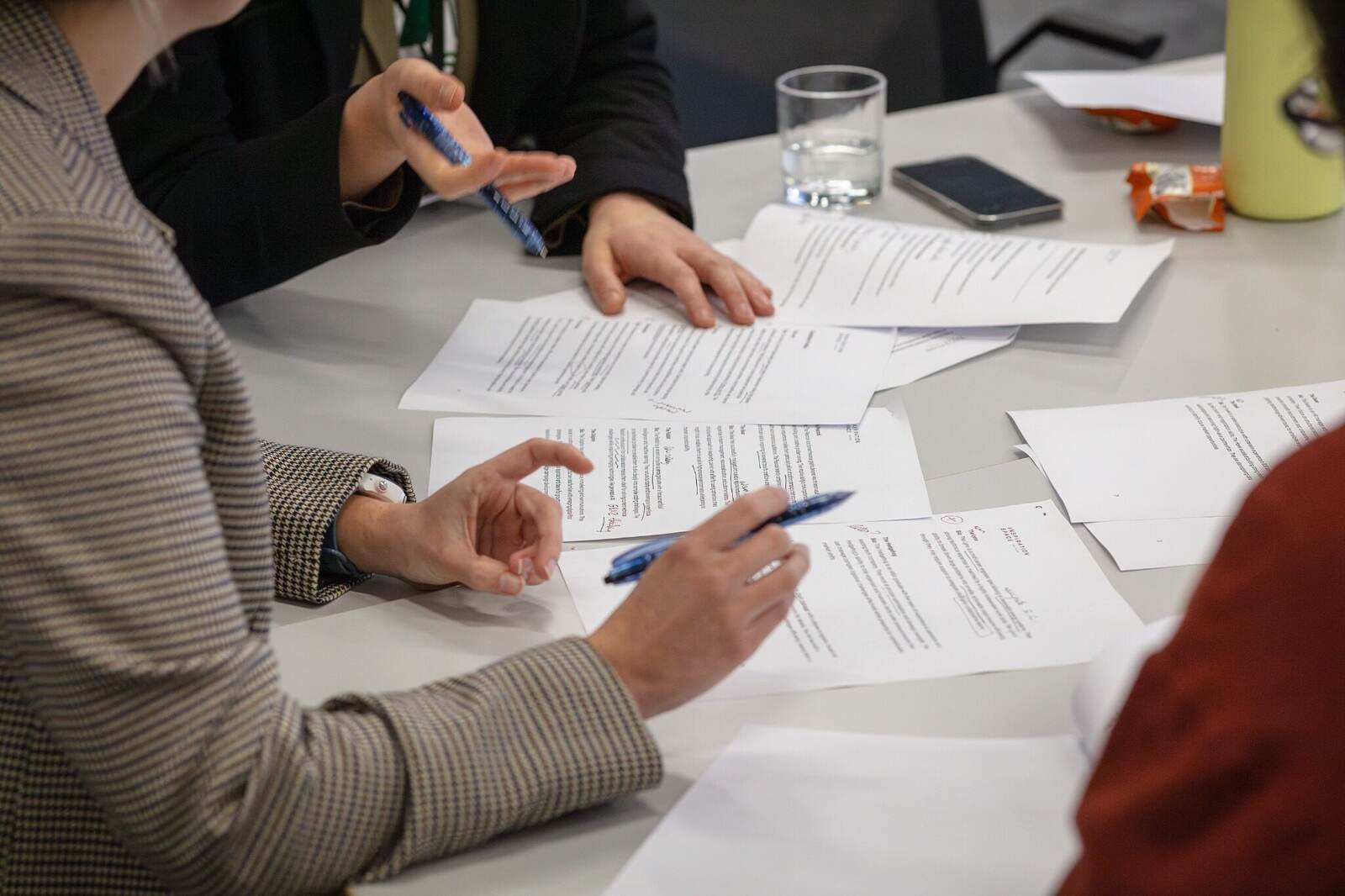 Participants applying ideas to practical workshop materials